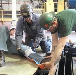 High Steel's First Aid team practices treating simulated shop related injuries in conjunction with our local EMS. 