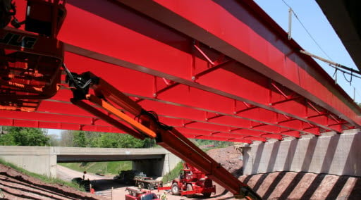 Painted steel bridge superstructure fabricated by High Steel Structures.